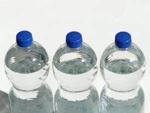 Three plastic orb water bottles.